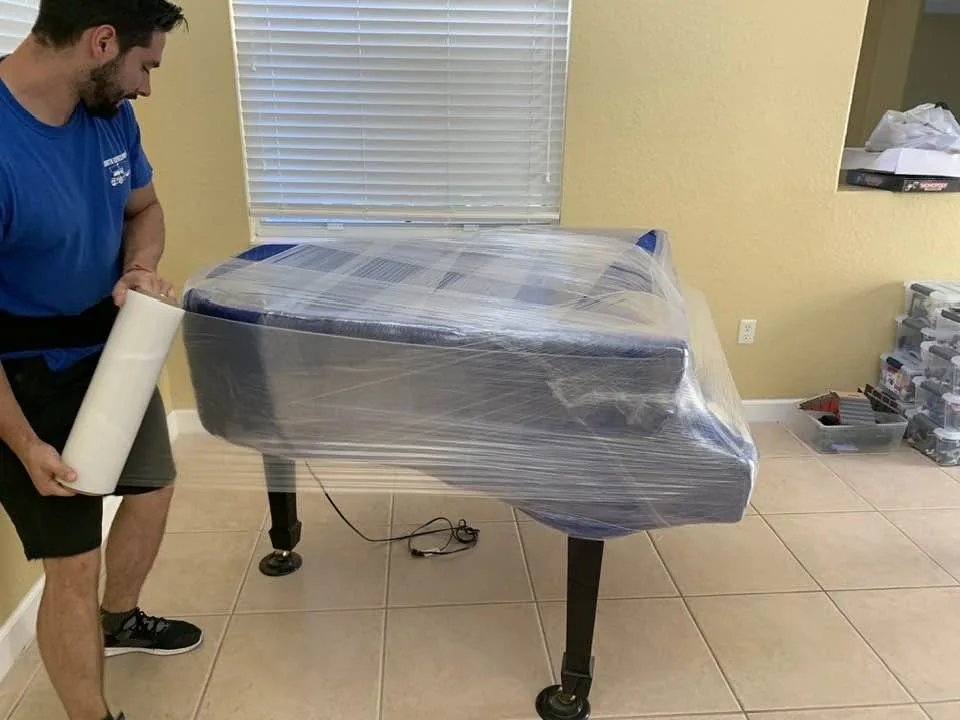 Piano protegido por South Express Moving durante la preparación para una mudanza